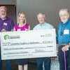 The Woodinville Chamber presents a $21,000 check to The Scholarship Foundation of Northshore. Photo courtesy of the Woodinville Chamber.